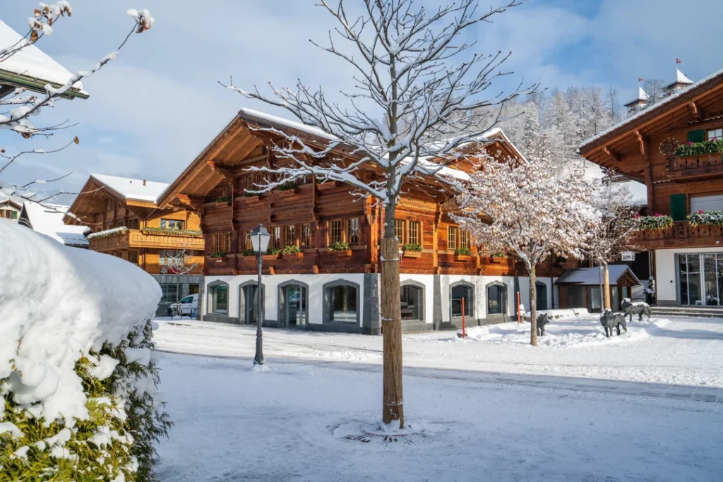 Wood chalet in Gstaad village in winter time